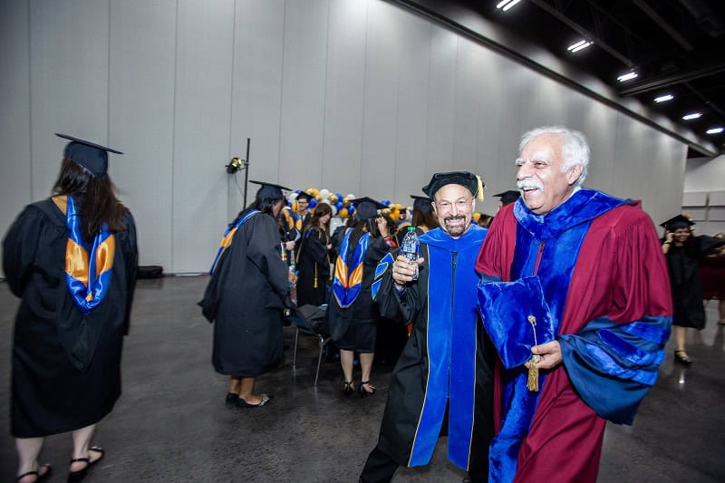 Faculty celebrate with graduates at Goizueta Commencement 2024