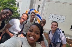 Students from Goizueta's One-Year MBA class of 2025 snap a "day one selfie" on campus.