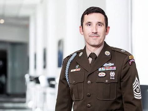 Phillip Paquette, a member of the first cohort of Goizueta's Master in Business for Veterans, poses in uniform